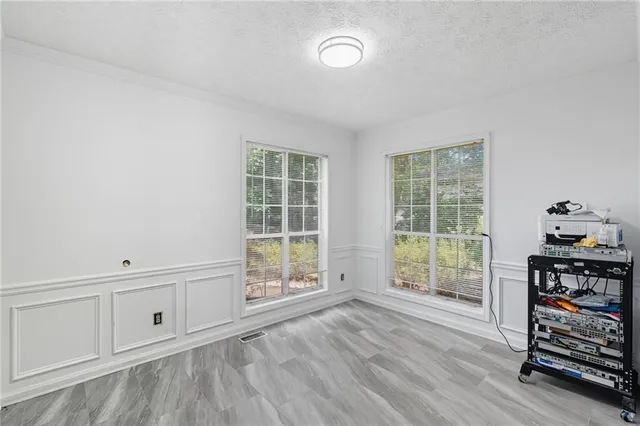 an empty room with windows