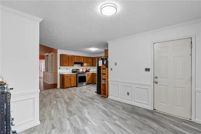 a view of a kitchen with wooden floor