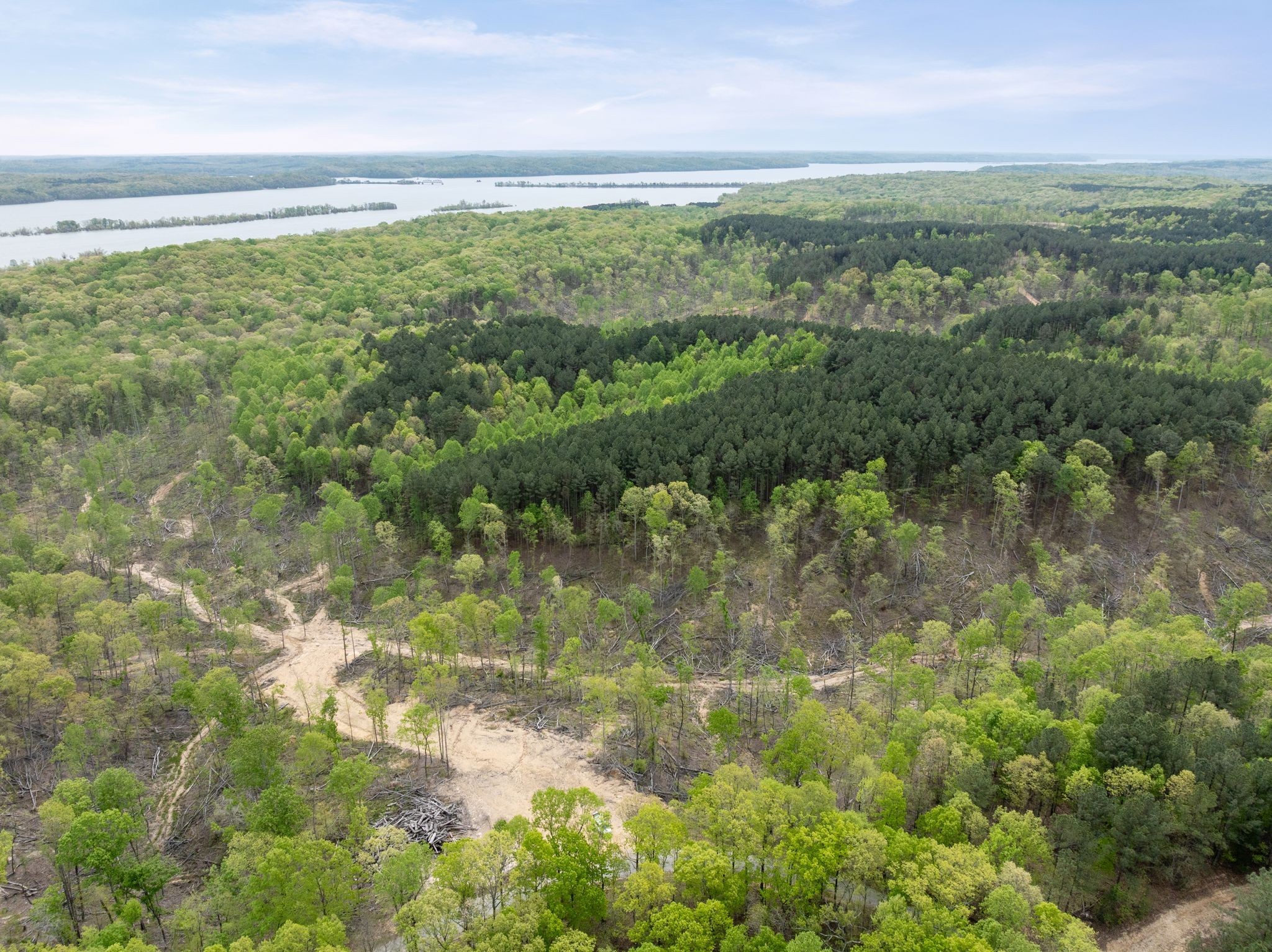 0 Sandys Camp Road Big Sandy, TN 38221 - Photo 50 of 59 a view of a lake with a city