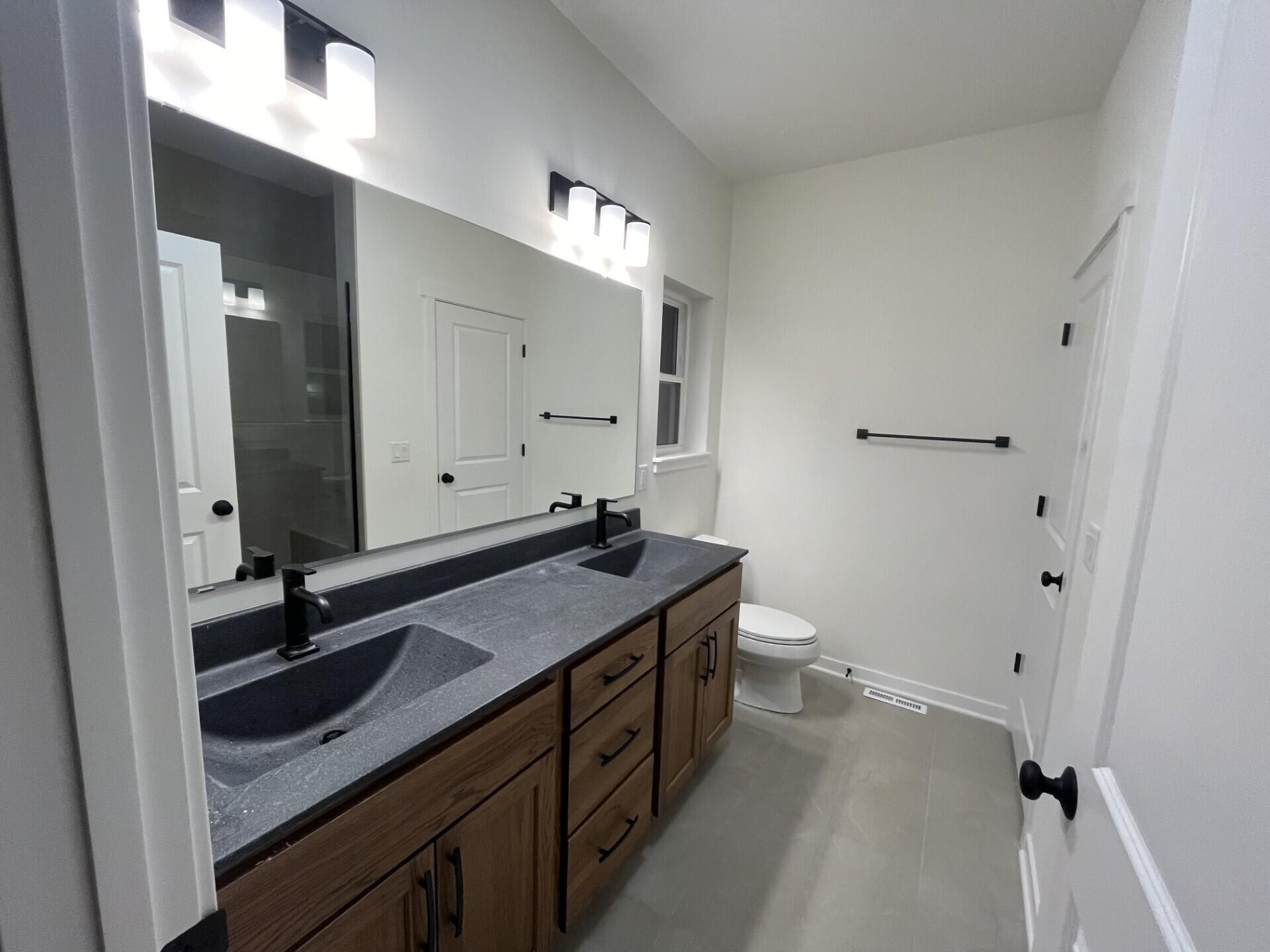 438 Sandstone Street Slinger, WI 53086 - Photo 7 of 8 Primary Bathroom w/ Two Sinks
