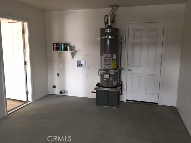 18745 Magnolia Court Hidden Valley Lake, CA 95467 - Photo 11 of 12 a room with an entryway and chandelier