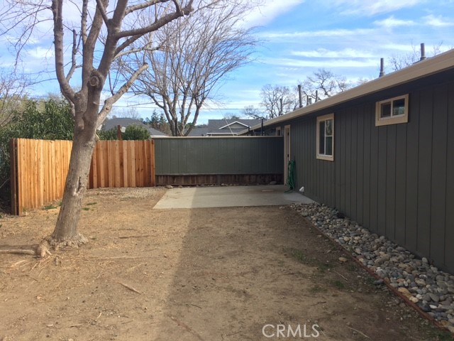 18745 Magnolia Court Hidden Valley Lake, CA 95467 - Photo 2 of 12 a view of backyard with large tree
