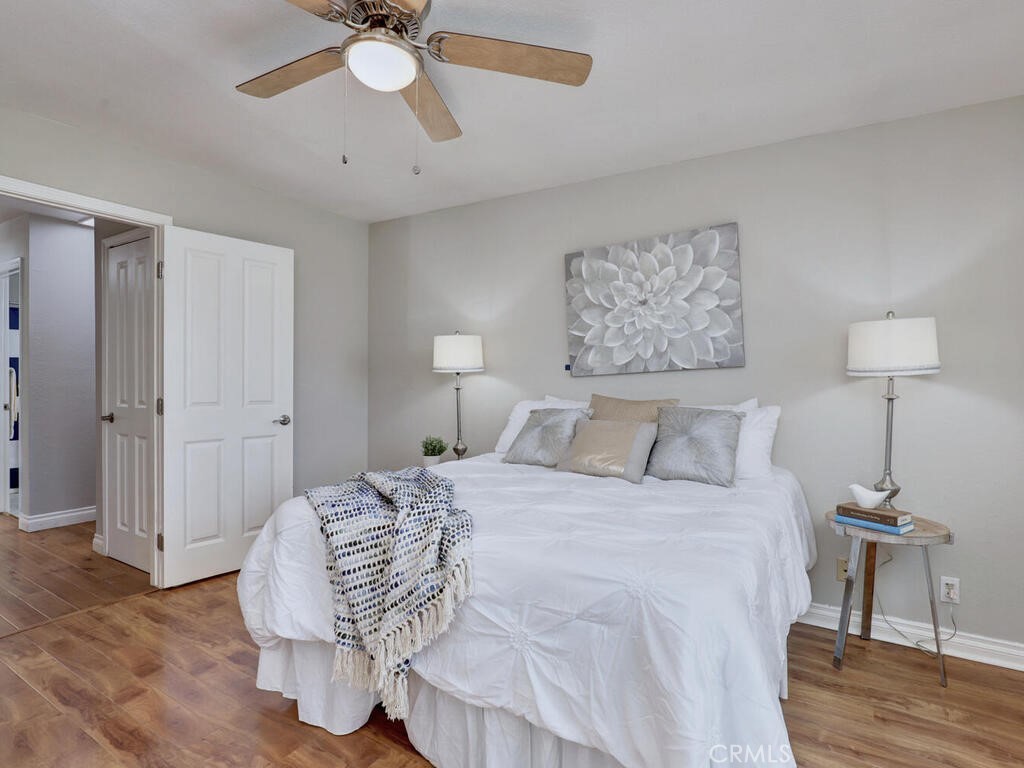 22661 Claude Circle Lake Forest, CA 92630 - Photo 14 of 50 a bedroom with a bed and a table