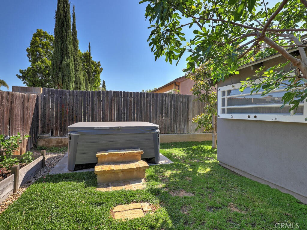 22661 Claude Circle Lake Forest, CA 92630 - Photo 26 of 50 a view of a backyard with a small cabin and a chair