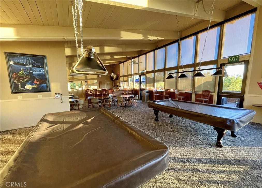 22661 Claude Circle Lake Forest, CA 92630 - Photo 46 of 50 a room with lots of furniture and wooden floor