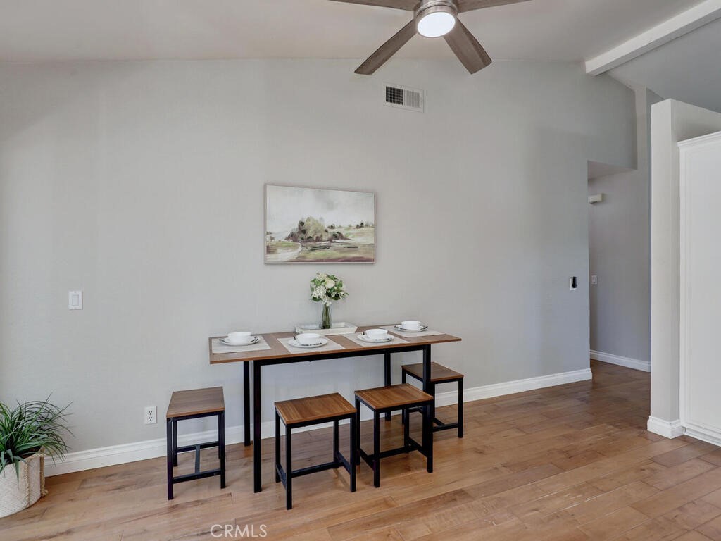 22661 Claude Circle Lake Forest, CA 92630 - Photo 9 of 50 a view of a workspace with furniture and wooden floor