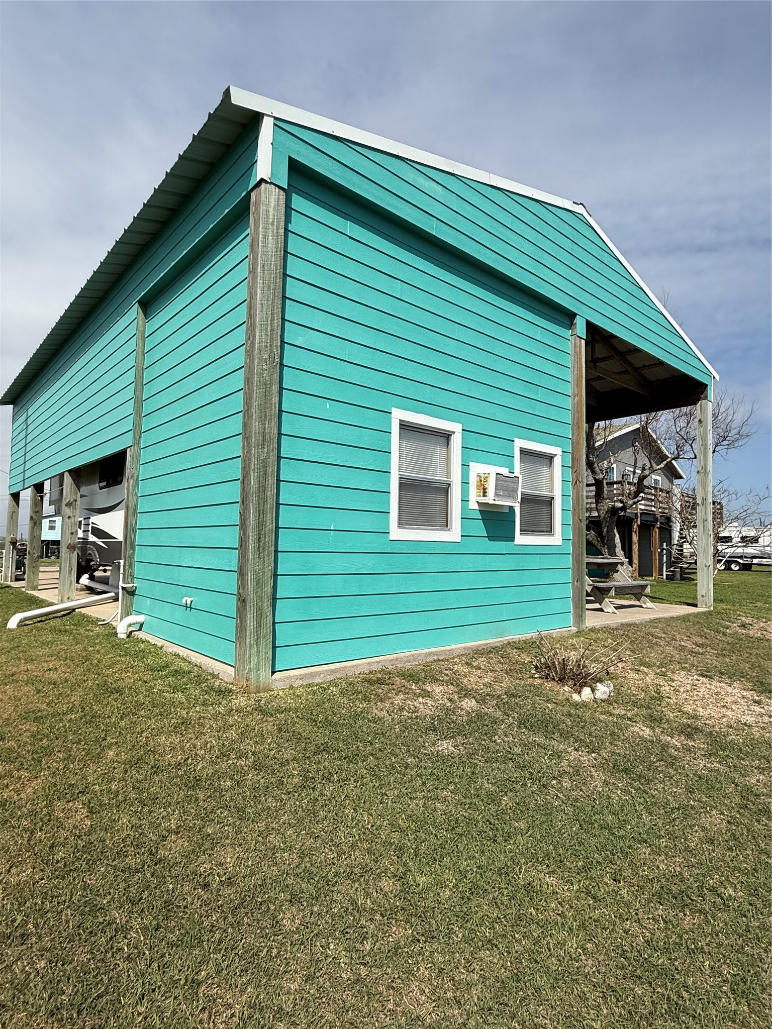 Lot 49-blk Sec 3 County Road 201 Sargent, TX 77414 - Photo 17 of 30 a view of a house with a backyard