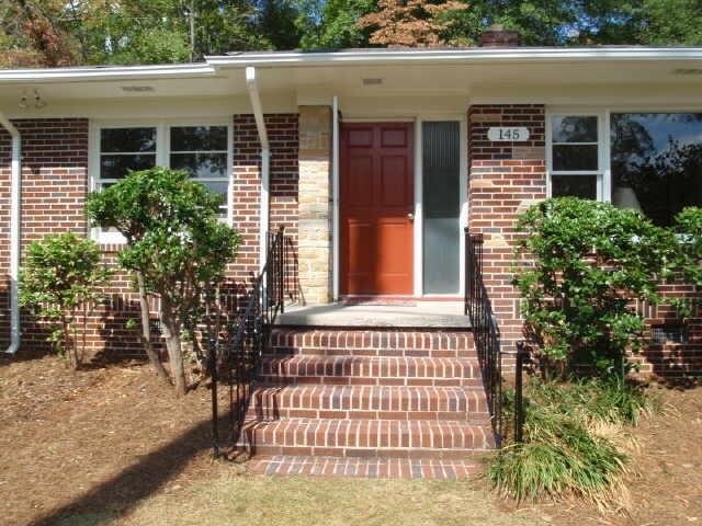 145 Dell Road Athens, GA 30606 - Photo 1 of 1 front view of a house with a porch