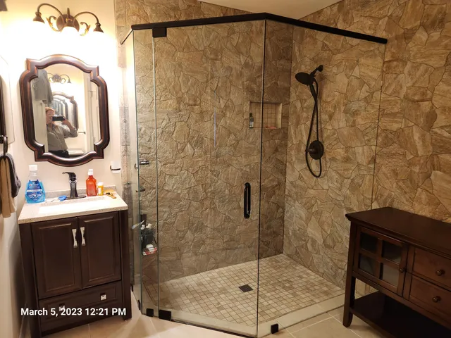 a bathroom with a sink and a mirror