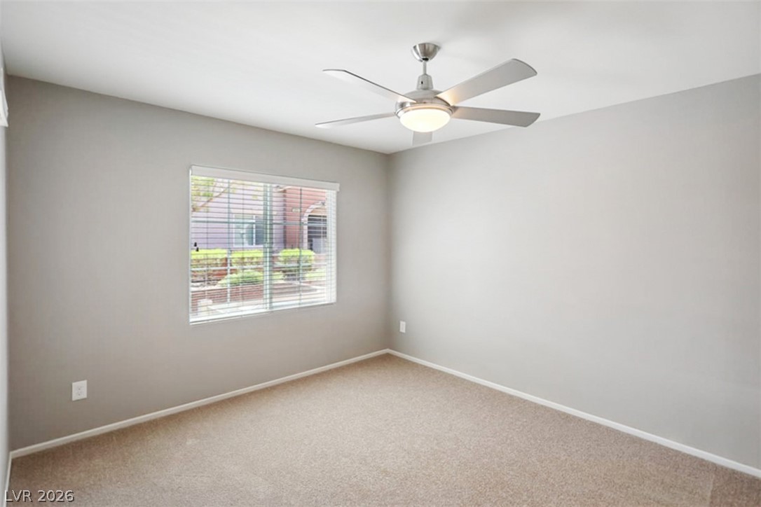 9940 Sable Point Street Las Vegas, NV 89178 - Photo 10 of 40 Unfurnished room with carpet and baseboards