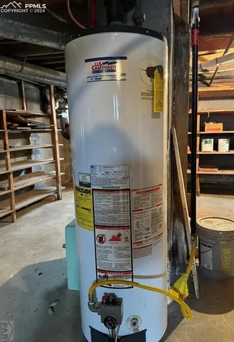 a view of a room with wooden walls