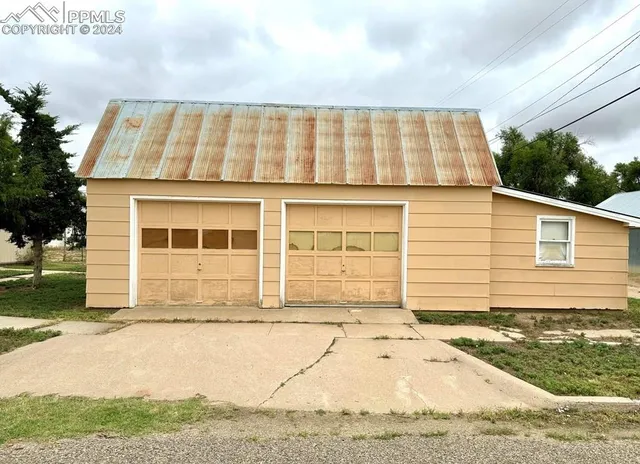 a view of an empty room with storage