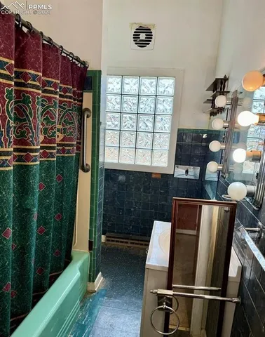 a view of room with stairs and a window