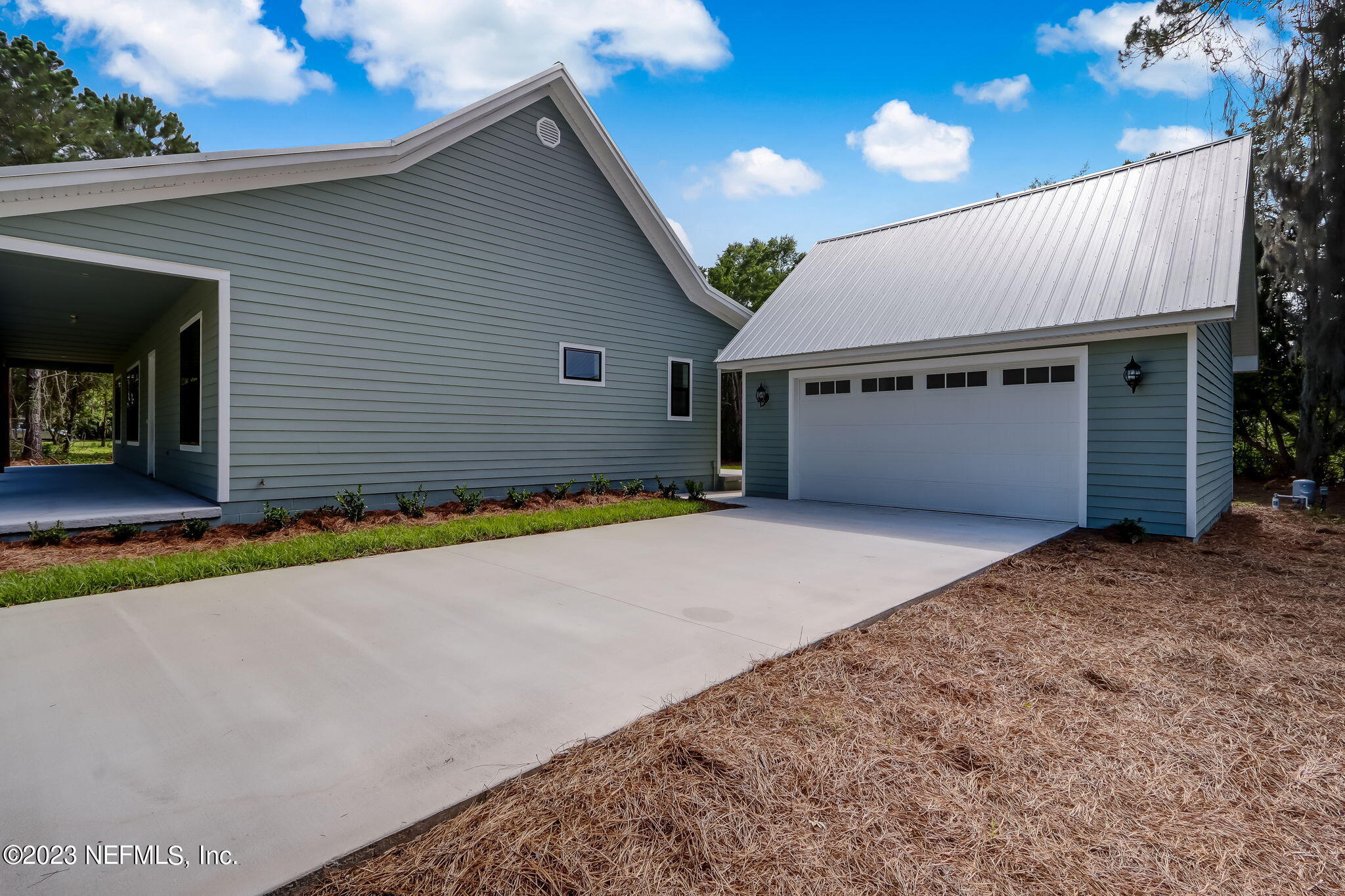 86277 Peeples Road Yulee, FL 32097 - Photo 3 of 36 a house with a yard