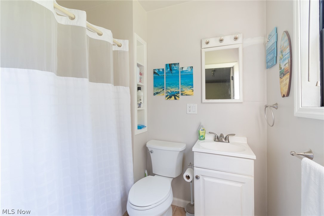 5561 Phillips Rice Road Cortland, OH 44410 - Photo 15 of 38 Master Bathroom with toilet and vanity