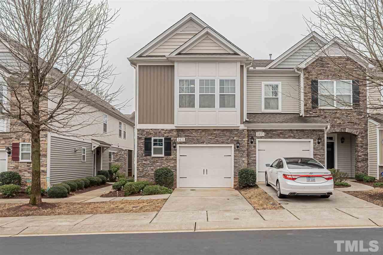 2431 Swans Rest Way Raleigh, NC 27606 - Photo 1 of 25 a white building with a outdoor space
