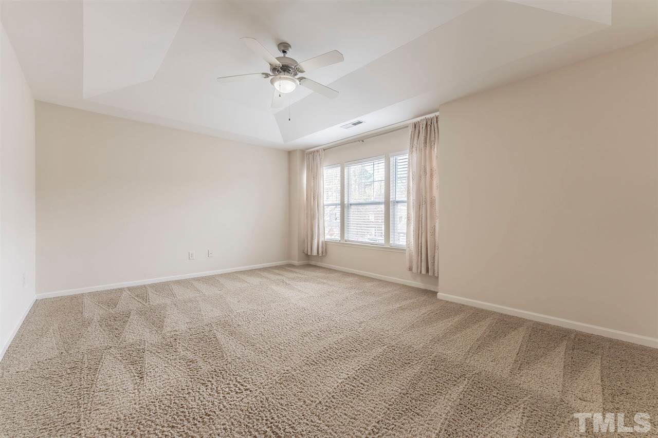 2431 Swans Rest Way Raleigh, NC 27606 - Photo 14 of 25 a view of an empty room with a window