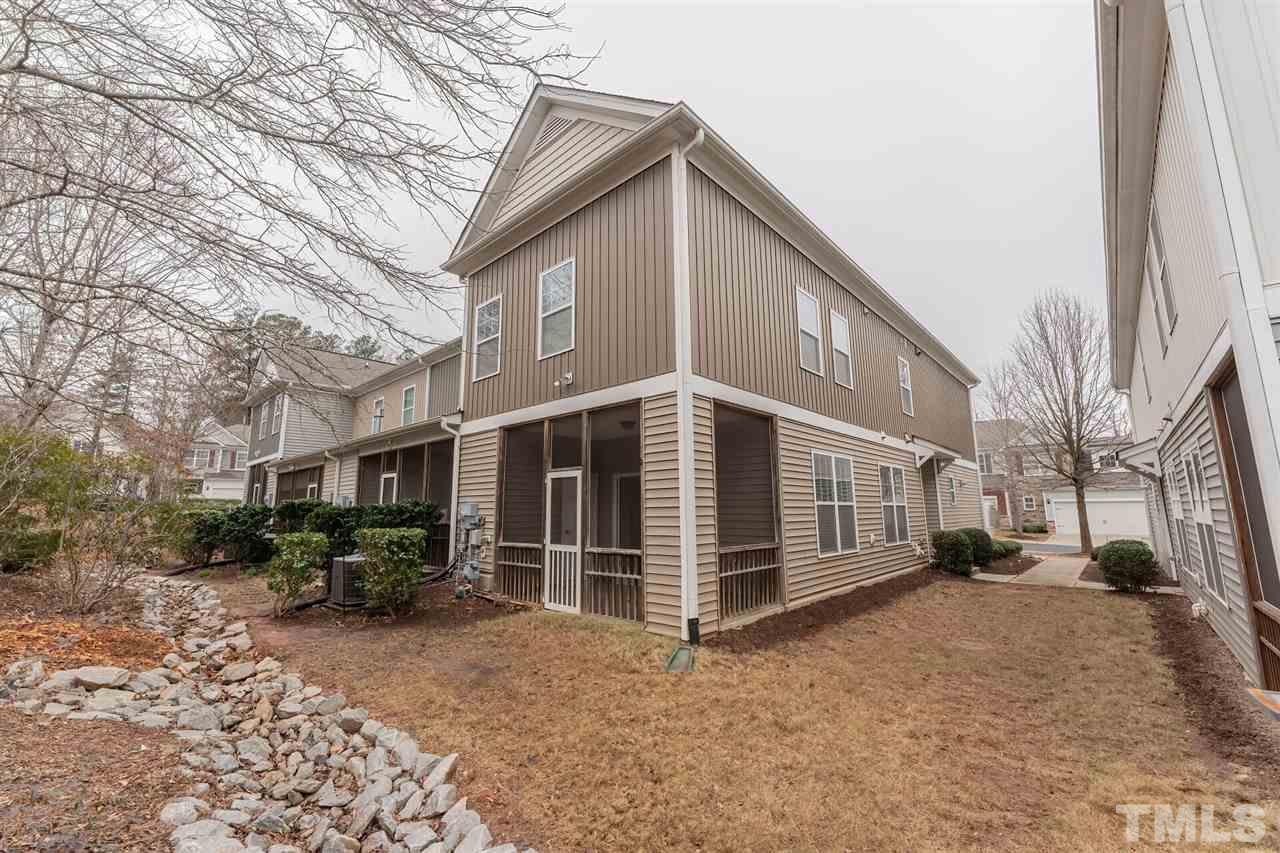 2431 Swans Rest Way Raleigh, NC 27606 - Photo 23 of 25 a view of a house with a yard