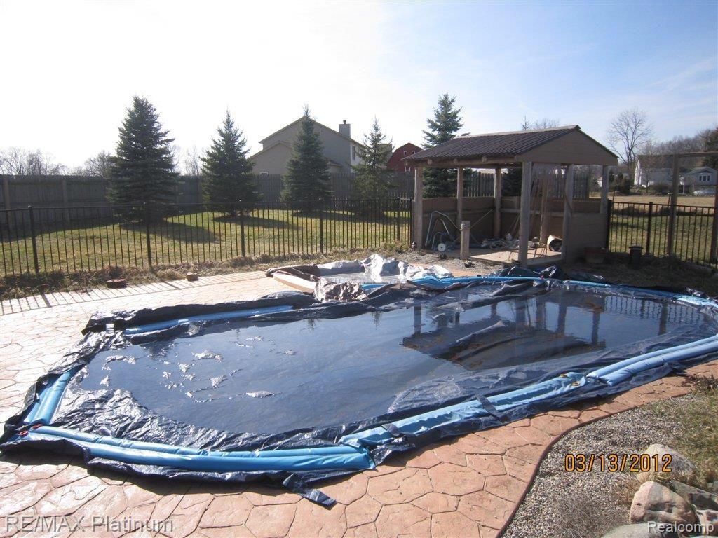6135 Baker Road Howell, MI 48843 - Photo 4 of 6 pool spring.jpg
