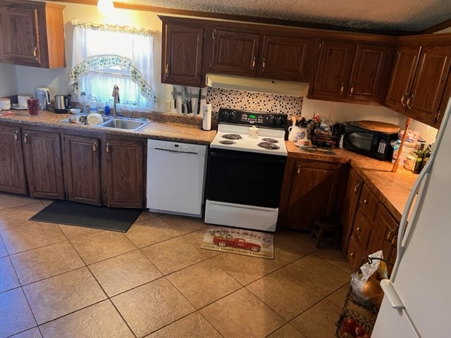 96735 Blackrock Road Yulee, FL 32097 - Photo 23 of 46 a kitchen with a cabinets and appliances