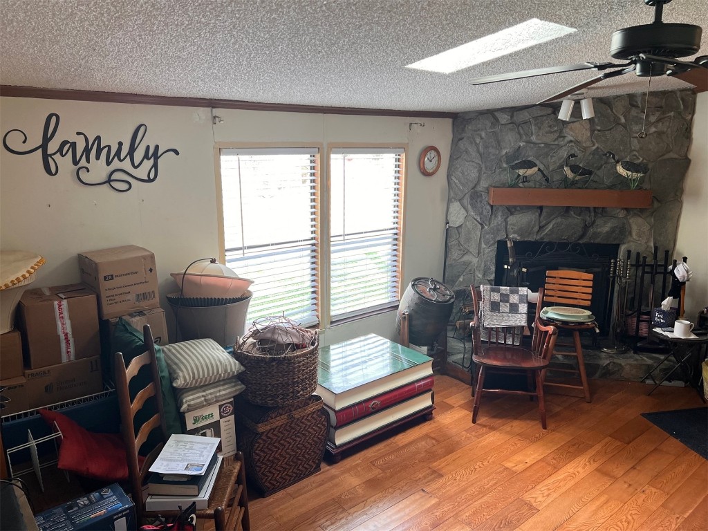 96735 Blackrock Road Yulee, FL 32097 - Photo 36 of 46 a living room with furniture and a fireplace