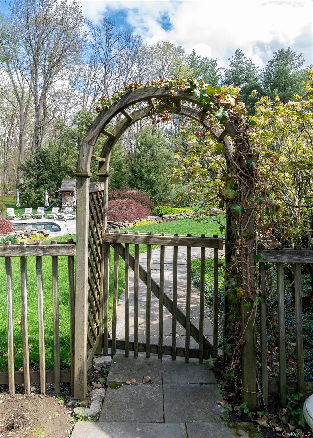 101 Post Office Road Waccabuc, NY 10597 - Photo 26 of 34 Arbor leading to pool area