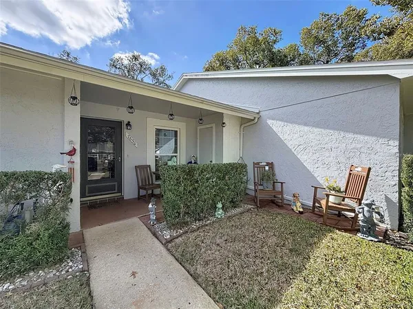 a view of a house with patio