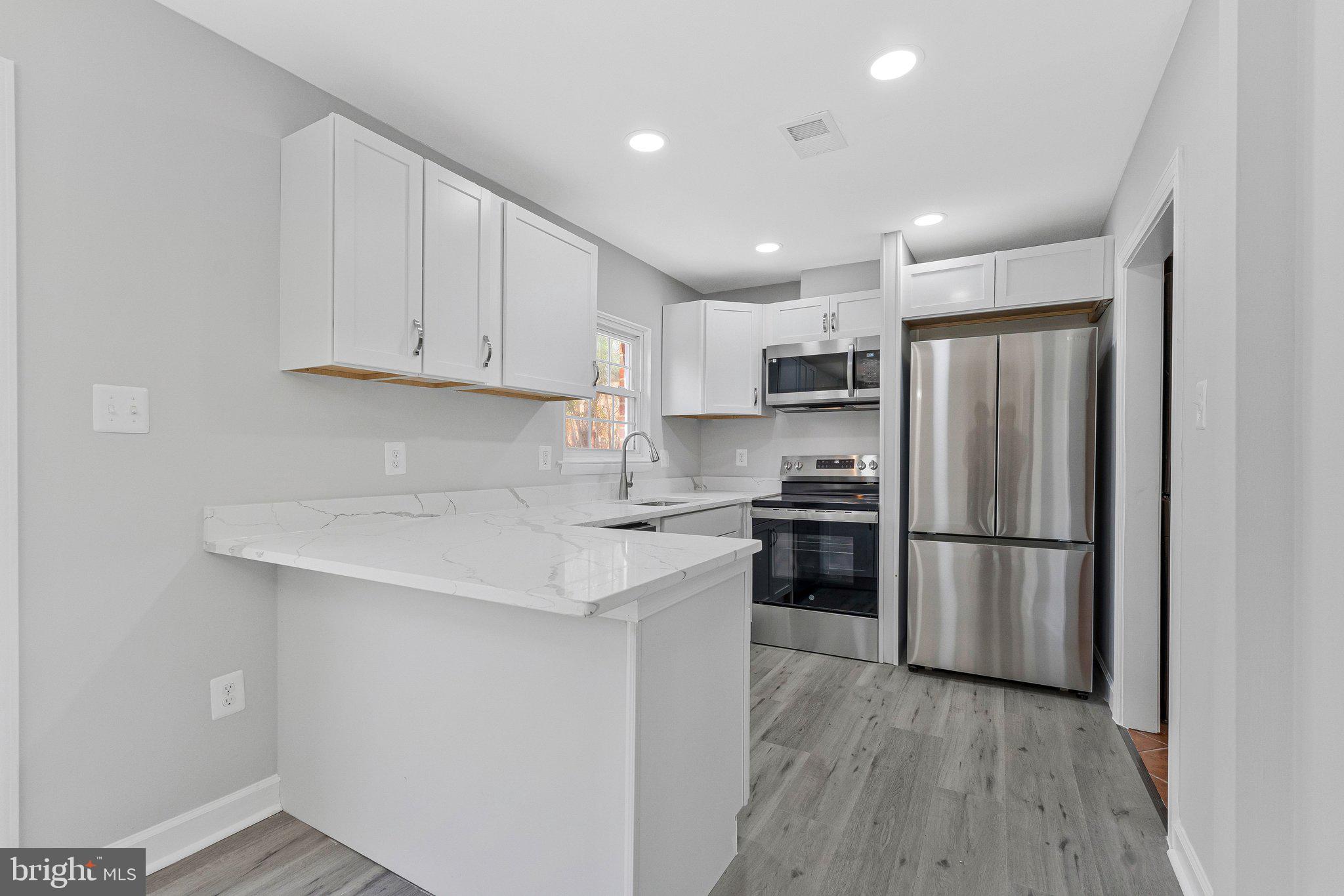 2254 Gunsmith Square Reston, VA 20191 - Photo 2 of 41 New White Cabinets