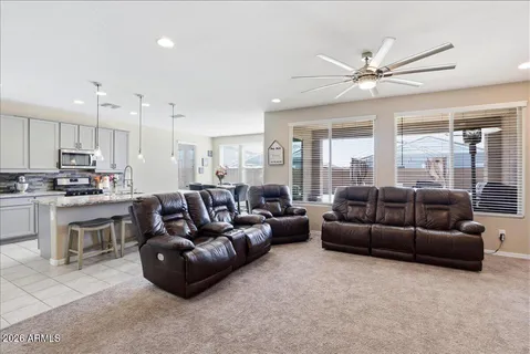 a kitchen with a table and chairs in it