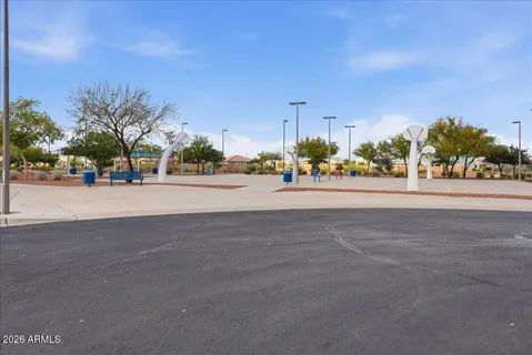 a view of a house with backyard and porch