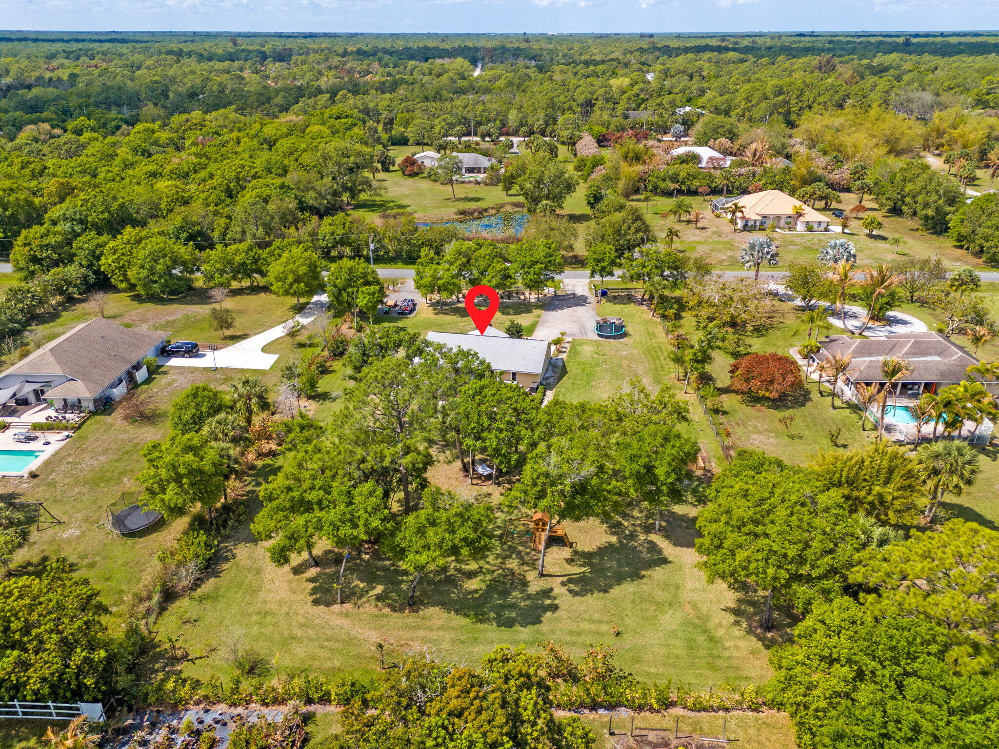 15340 98th Trail North Jupiter, FL 33478 - Photo 50 of 51 62-web-or-mls-DJI_20260310132730_0012_D-