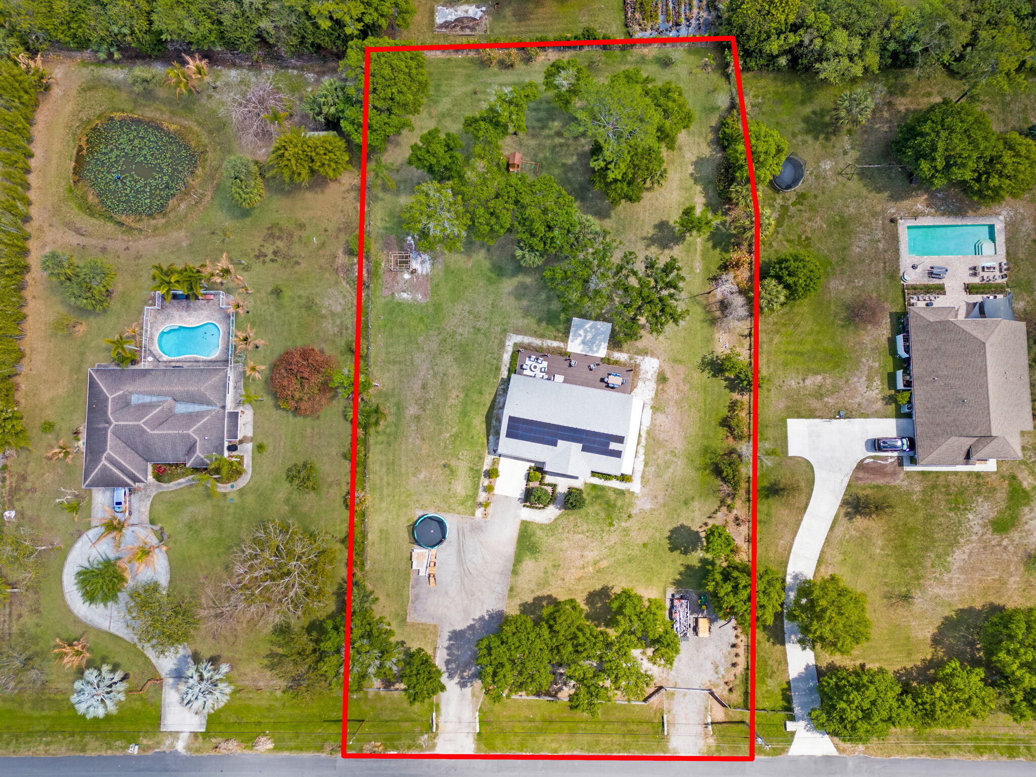 15340 98th Trail North Jupiter, FL 33478 - Photo 51 of 51 66-web-or-mls-DJI_20260310132906_0016_D-