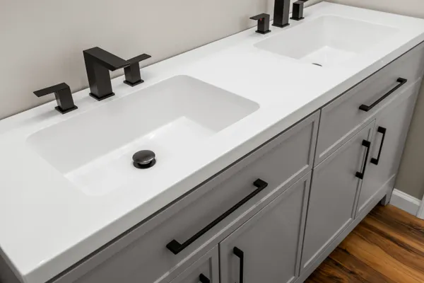 a view of a room with wooden floor and bathroom