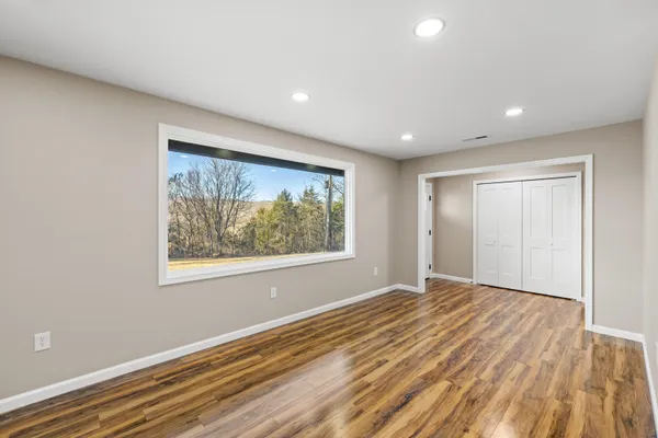 a kitchen with stainless steel appliances a refrigerator sink and stove