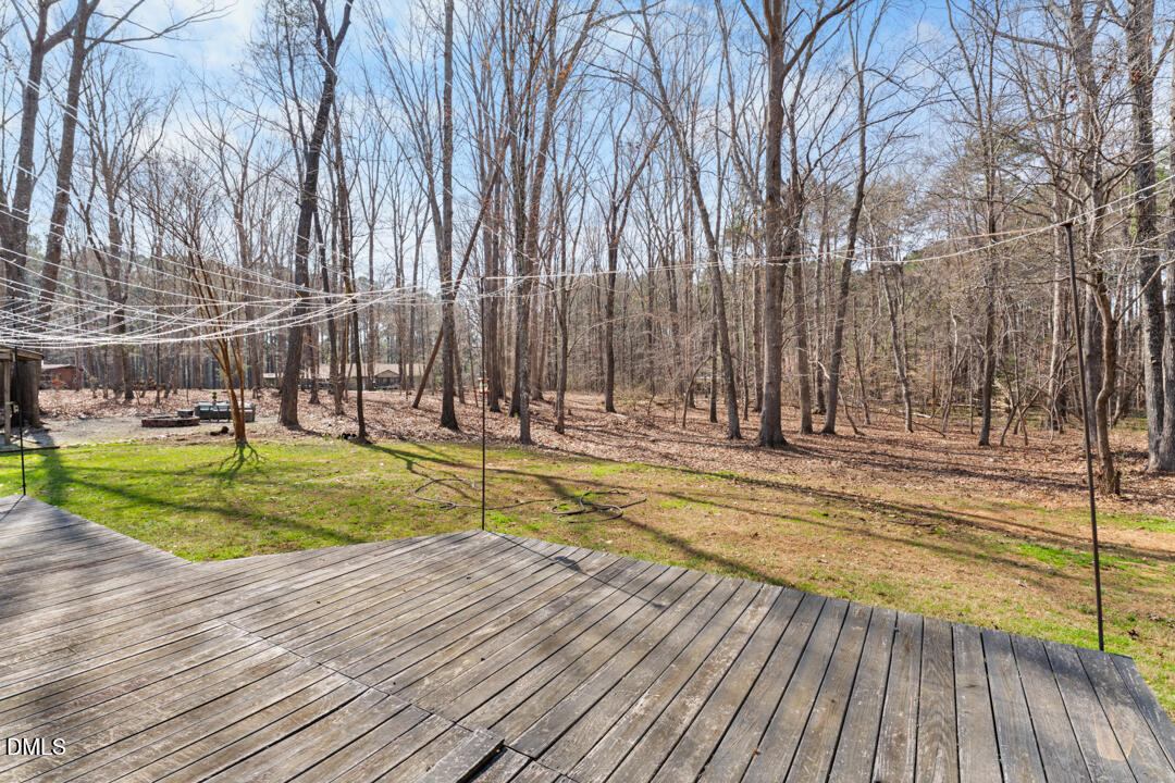 4739 Wild Azalea Place Rougemont, NC 27572 - Photo 33 of 48 a view of swimming pool and trees in the background