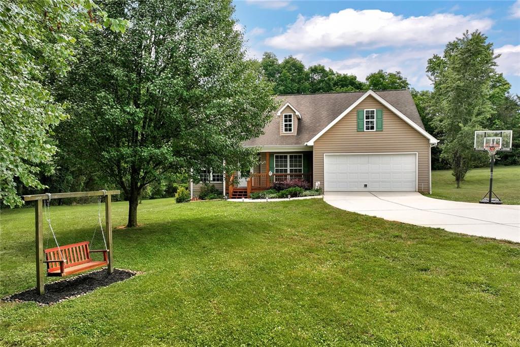 1044 Lothridge Road Cleveland, GA 30528 - Photo 40 of 40 a front view of a house with a yard