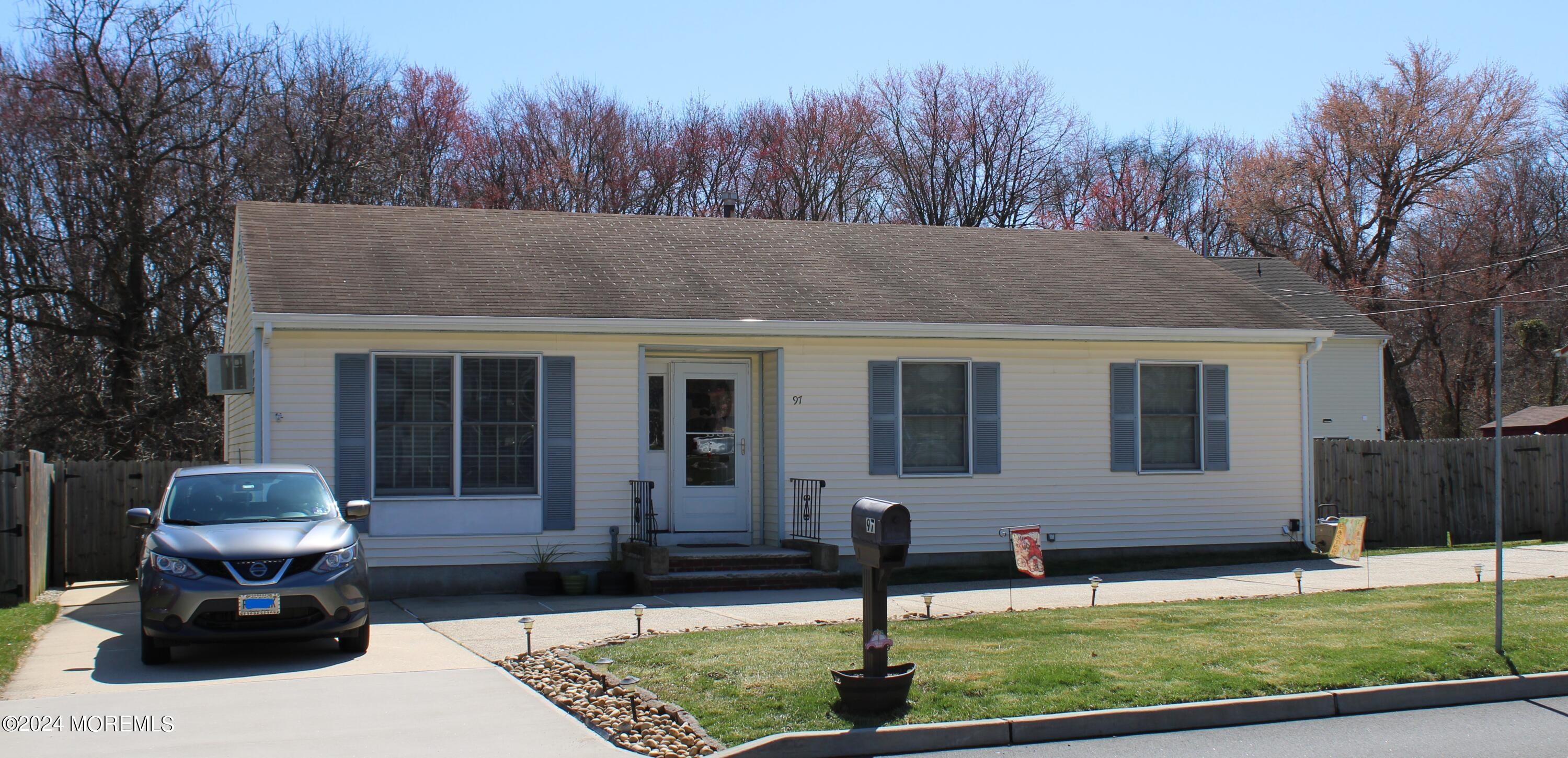 97 County Road Cliffwood, NJ 07721 - Photo 1 of 24 a front view of a house with garden