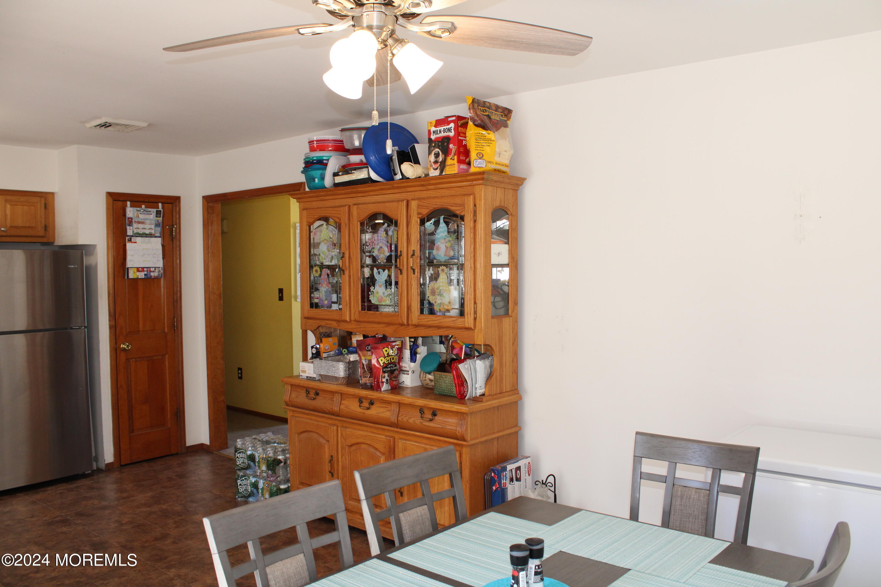 97 County Road Cliffwood, NJ 07721 - Photo 12 of 24 a view of a dining room with furniture and chandelier