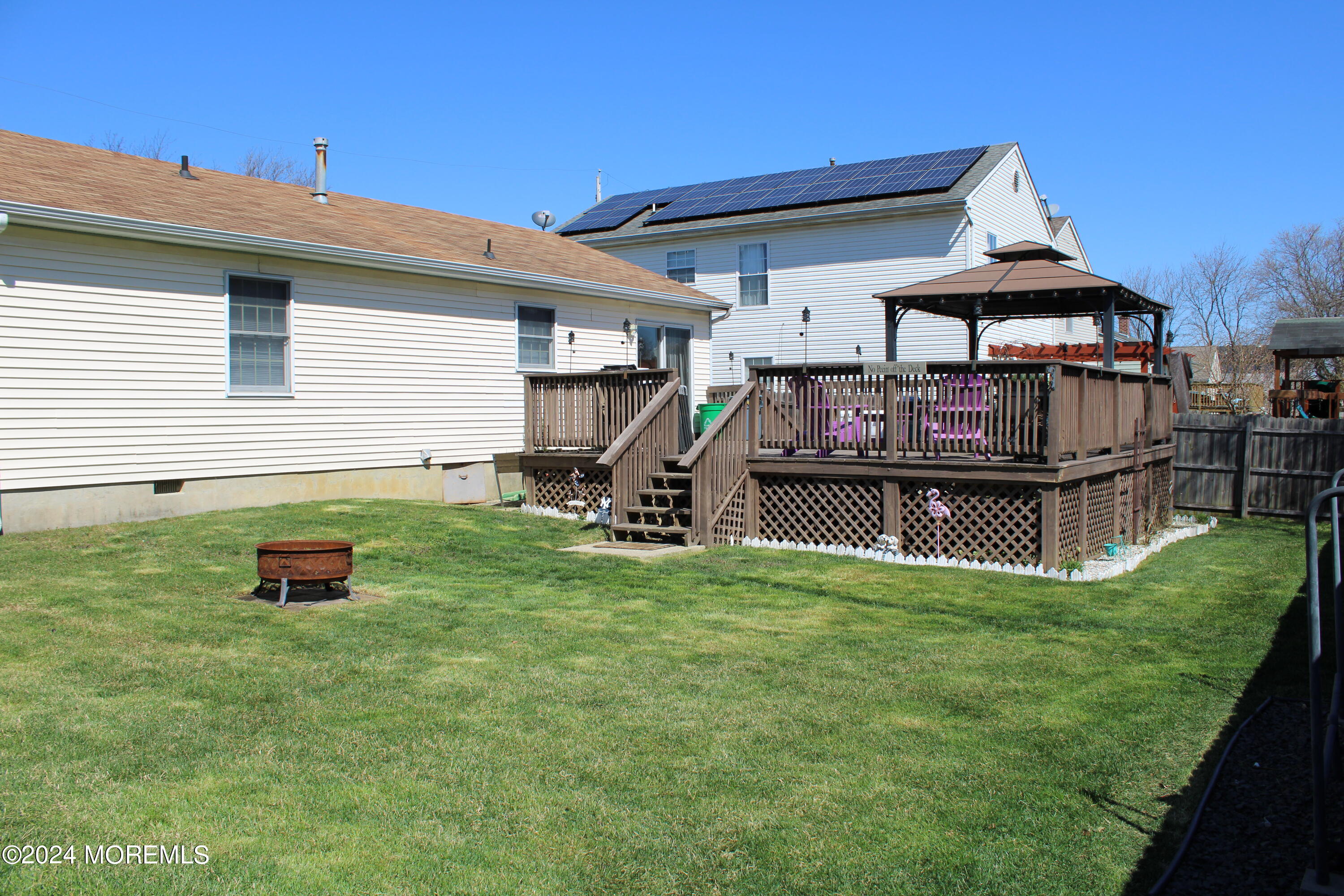 97 County Road Cliffwood, NJ 07721 - Photo 5 of 24 a view of a house with a back yard