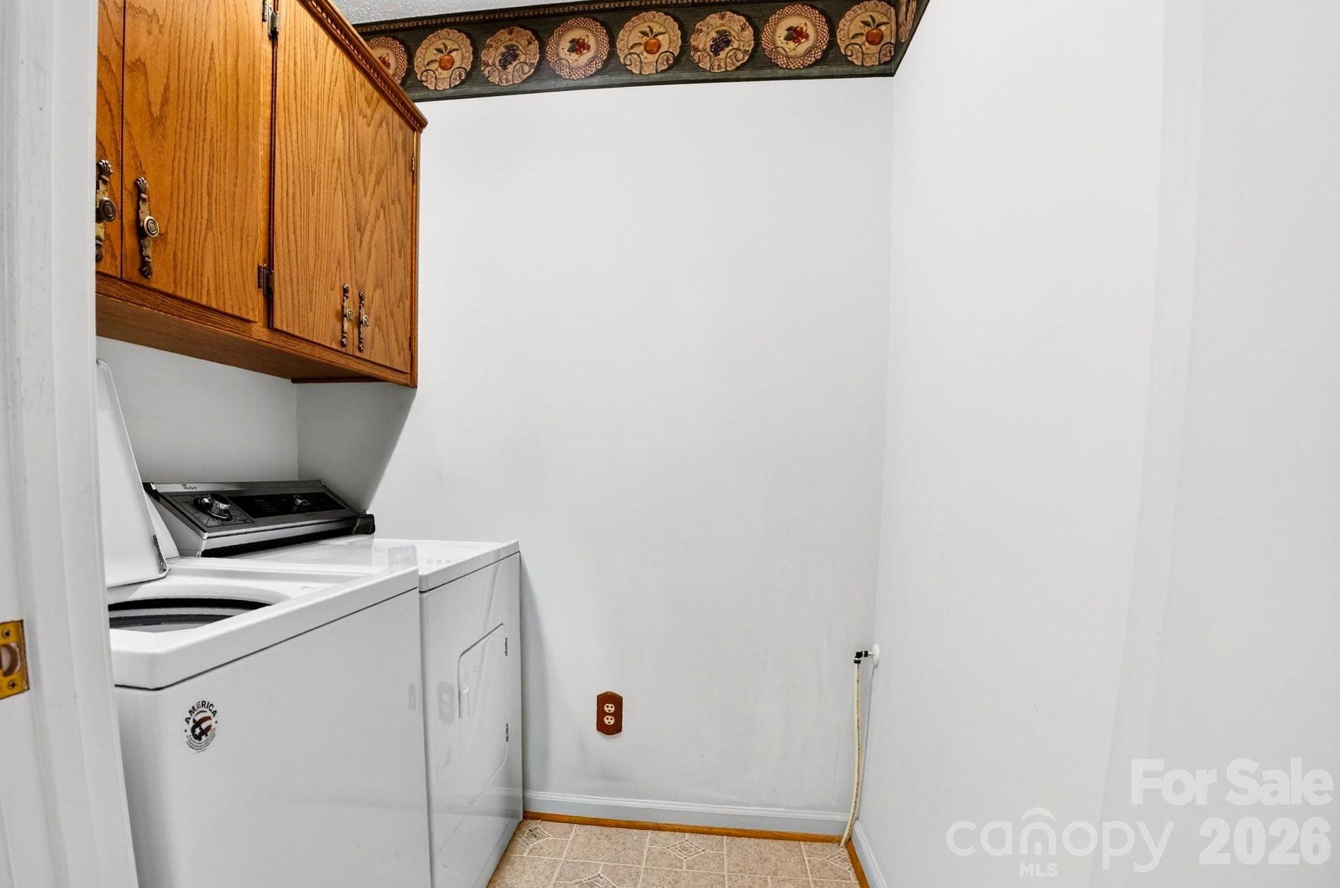 703 Independence Trail Morganton, NC 28655 - Photo 12 of 31 a utility room with dryer and washer