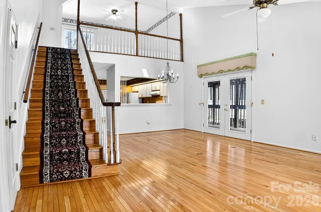 a kitchen with stainless steel appliances a refrigerator and microwave