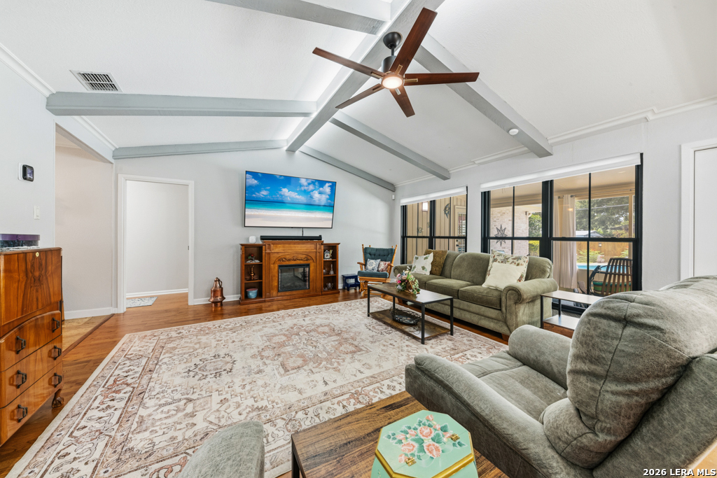 6022 Winding Ridge Drive Windcrest, TX 78239 - Photo 8 of 31 a living room with furniture and a flat screen tv