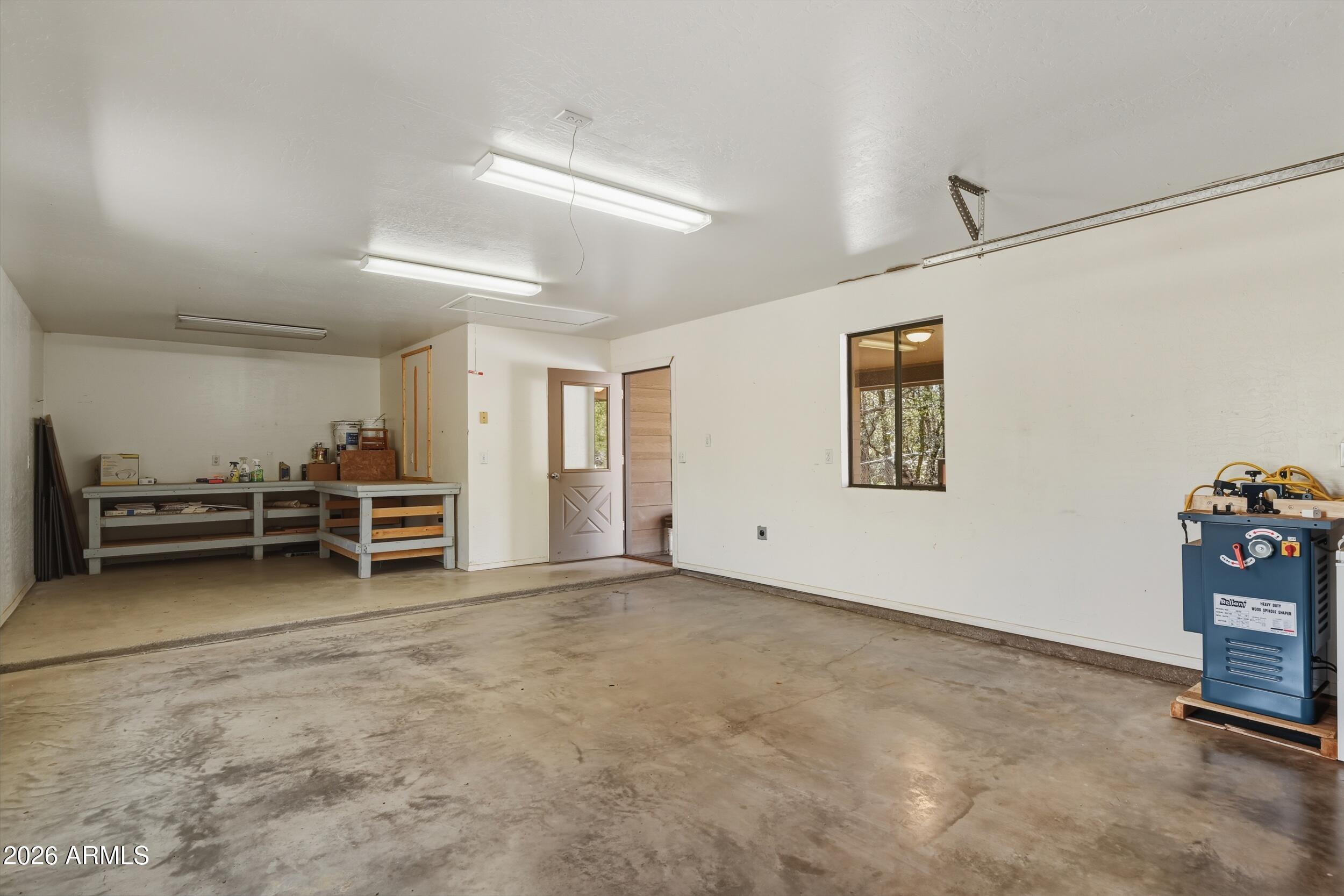 1101 North McLane Road Payson, AZ 85541 - Photo 41 of 65 a view of a room with racks on the wall