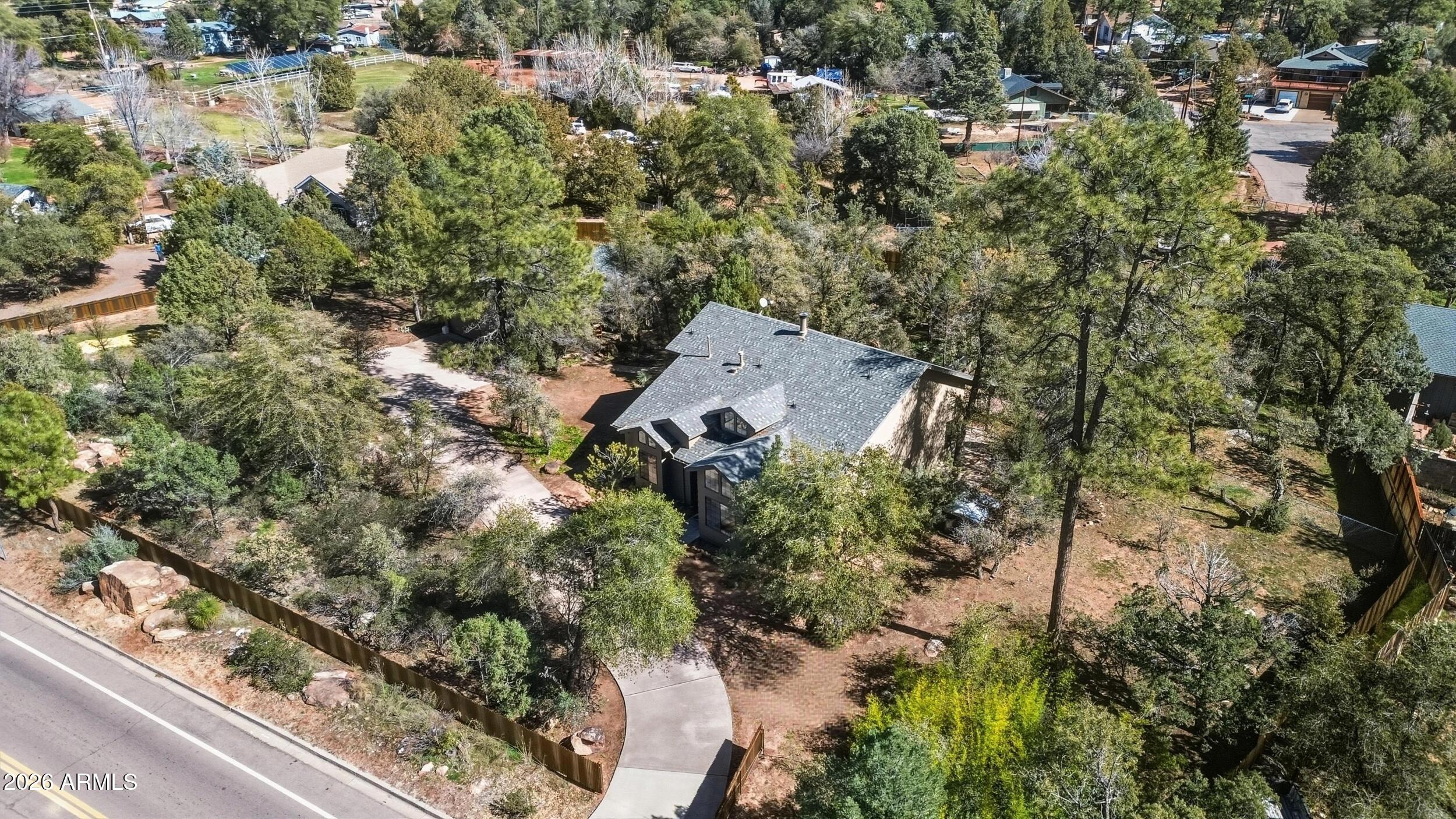 1101 North McLane Road Payson, AZ 85541 - Photo 46 of 65 an aerial view of a house with a yard and lake view
