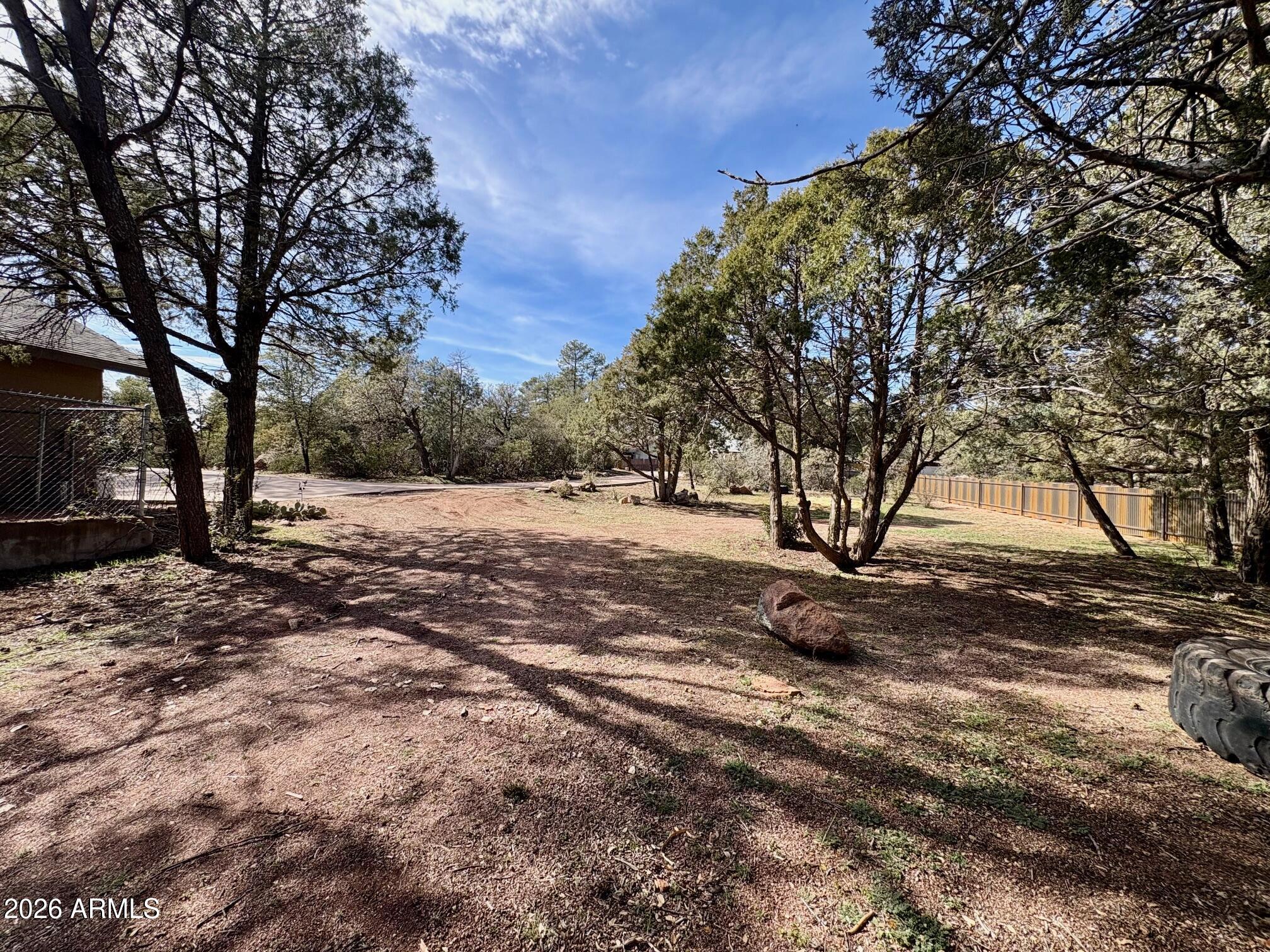1101 North McLane Road Payson, AZ 85541 - Photo 56 of 65 a view of backyard with tree