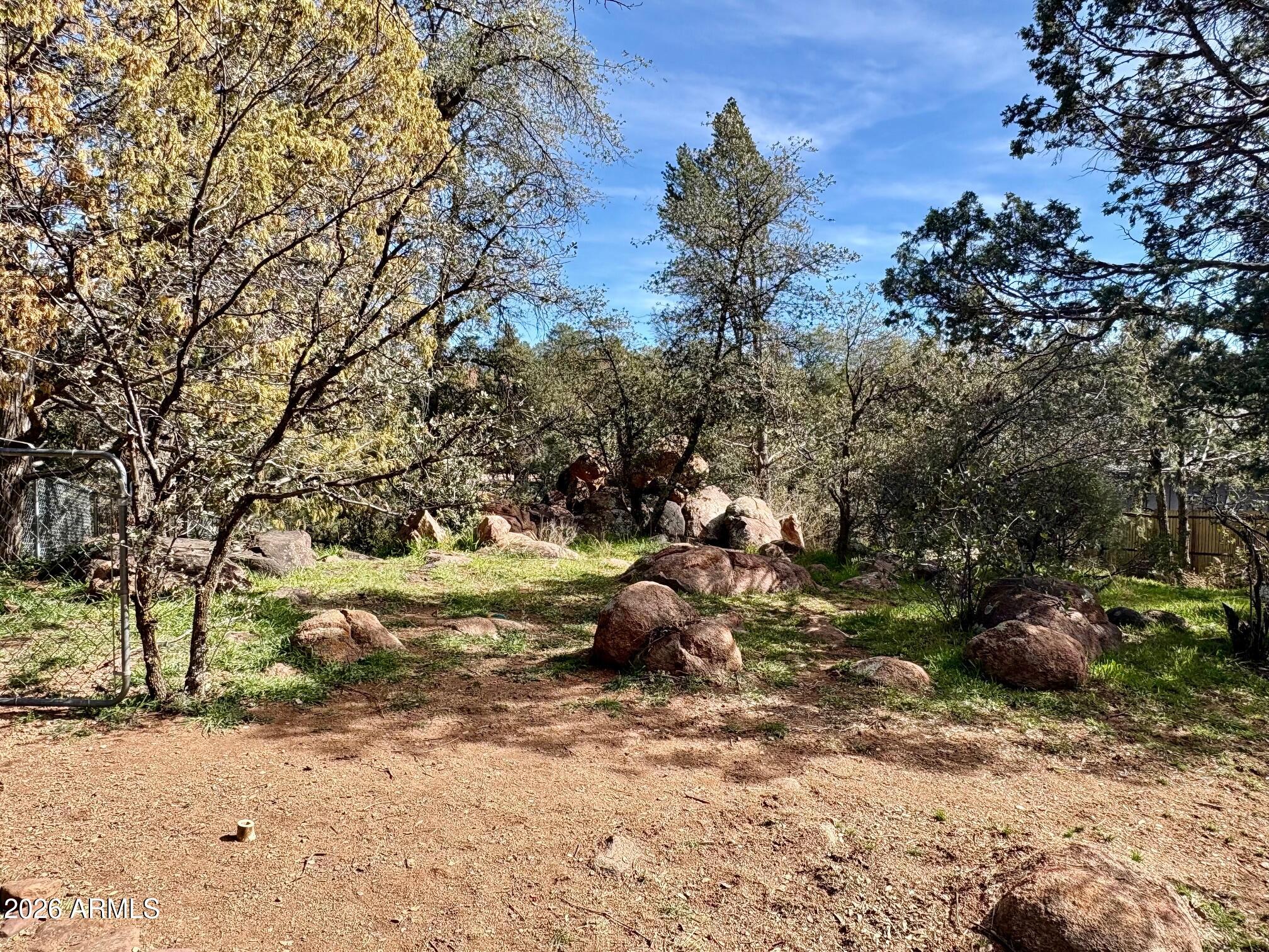 1101 North McLane Road Payson, AZ 85541 - Photo 59 of 65 a backyard of a house with lots of green space