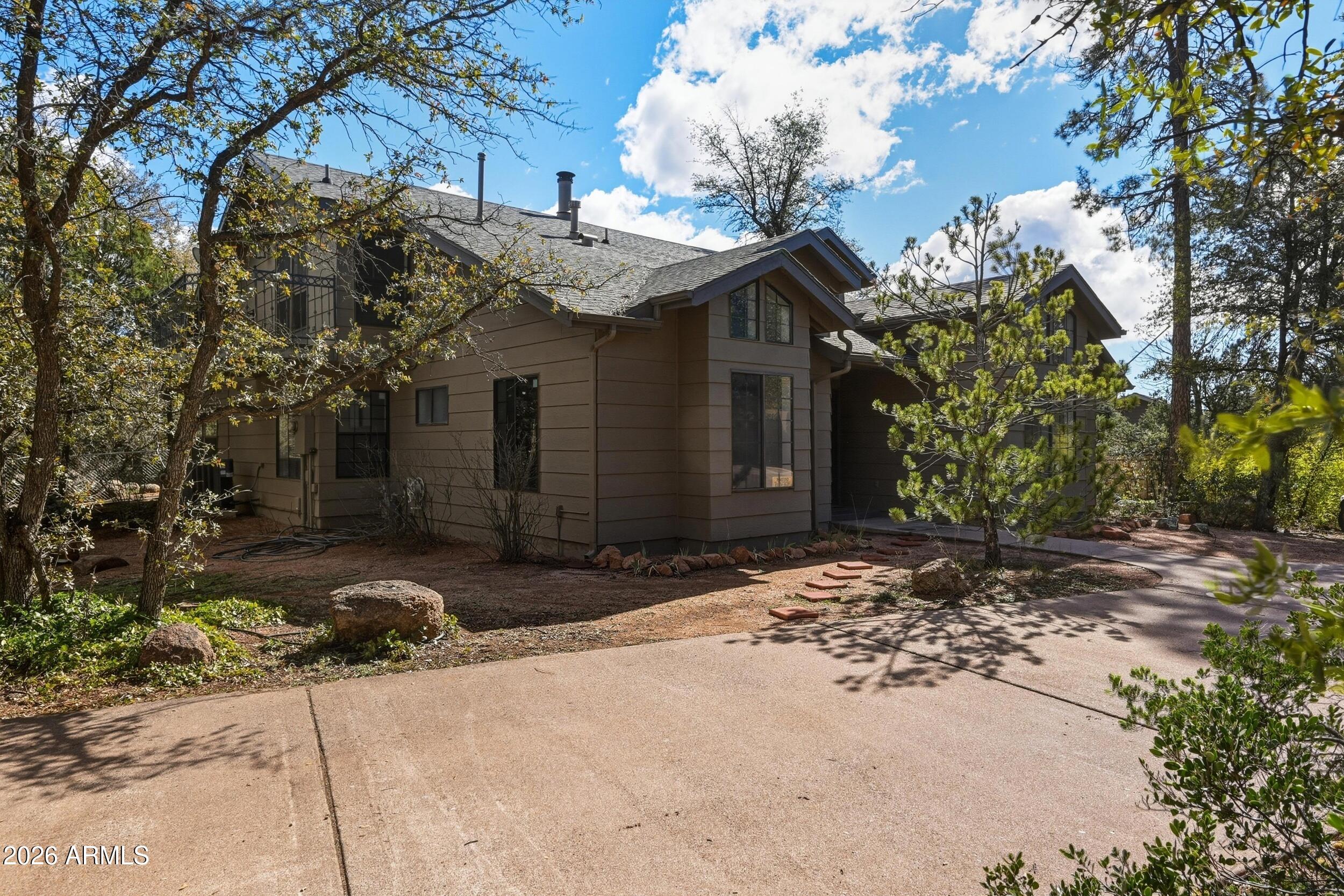 1101 North McLane Road Payson, AZ 85541 - Photo 6 of 65 a view of a house with a snow in the yard