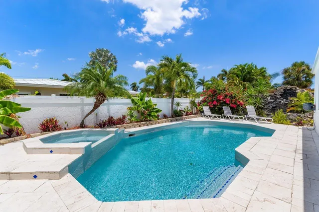 a house with garden in front of it