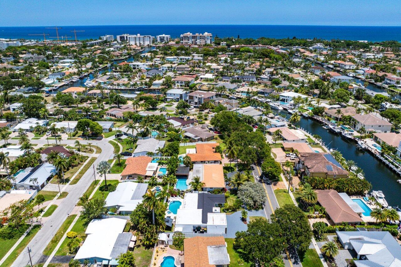 2611 Northeast 49th Street Lighthouse Point, FL 33064 - Photo 47 of 56 an aerial view of residential houses with outdoor space