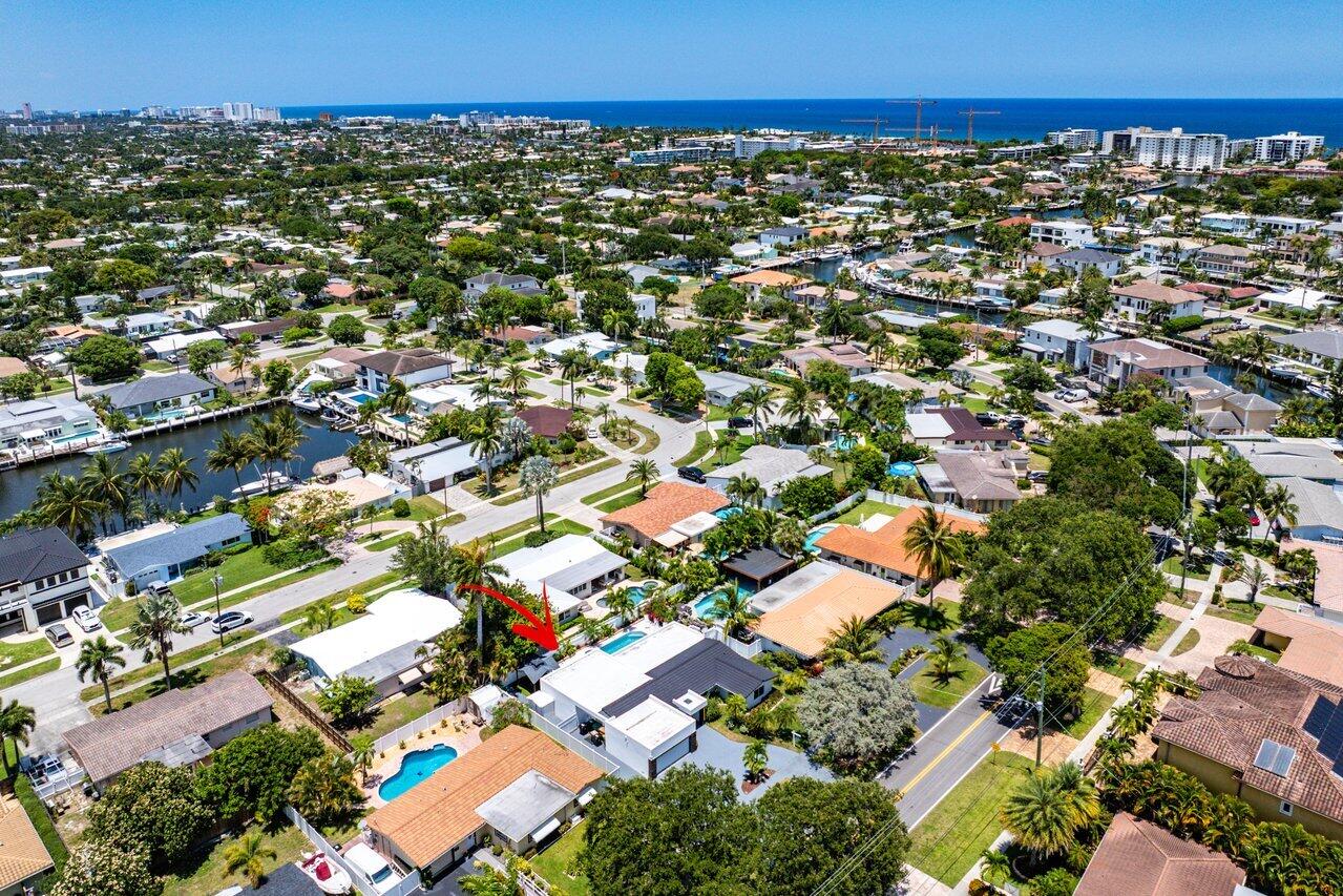 2611 Northeast 49th Street Lighthouse Point, FL 33064 - Photo 48 of 56 an aerial view of residential houses with outdoor space